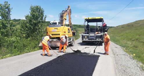 Intretinerea drumurilor: Trei firme de constructii, amendate pentru trucarea licitatiilor